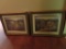 Pair of gold colored framed prints