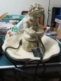 Plastic figurine fountain