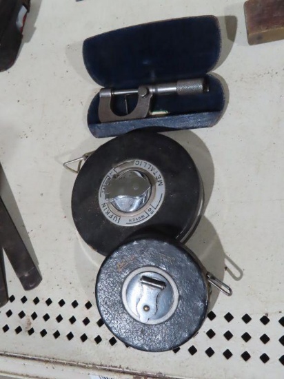 Machinist caliper and vintage tape measures