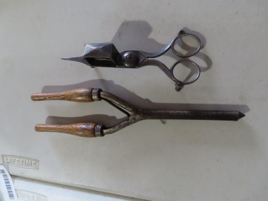 Antique curling iron and candle snuffer