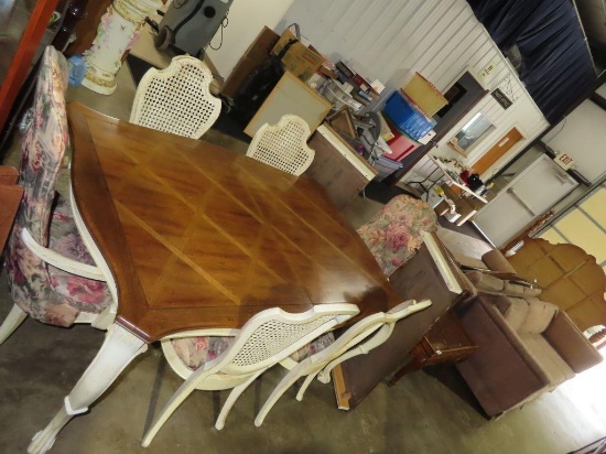 Fruitwood table with six chairs and two extra leaves