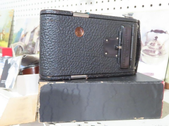 Antique Kodak camera with box and booklet
