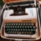 Antique Smith Corona typewriter with case