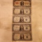 (4) One dollar...silver certificates and (1) Two dollar...bill