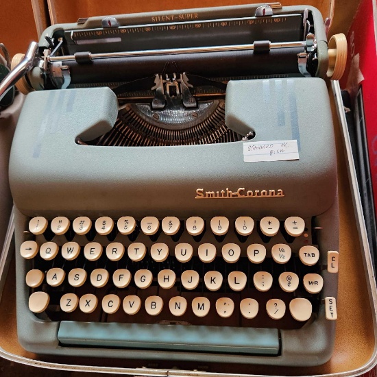 Antique Smith Corona typewriter with case