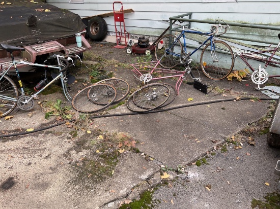 Assorted bicycles and bicycle parts