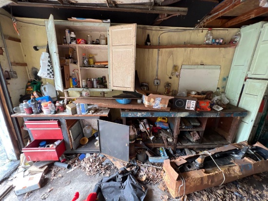 Assorted tools, workbench, bench grinder, radio and etc on left wall