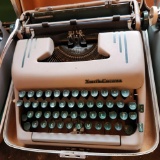 Antique Smith Corona typewriter with case