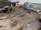 Assorted bicycles and bicycle parts