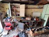 Assorted tools, workbench, bench grinder, radio and etc on left wall