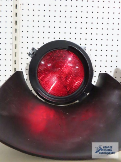 Railroad lamp signal with red shade