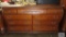 Cherry finish dresser with mirror by Ashley Furniture, matches lots 184, 198,... 200, and 201