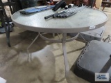 Glass top round outdoor table