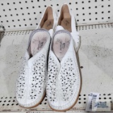 Two pairs of women's white shoes