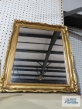 Gold painted framed mirror