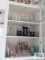 Lot of glasses and etc in cabinet