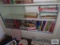 Lot of books on bottom two shelves
