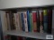 Lot of books on top two shelves