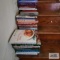 Three stacks of cookbooks