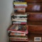 Three stacks of cookbooks