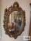 Gold framed wall mirror