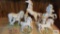 Lot of porcelain gallery unicorn figurines. One...has a broken horn