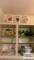 Enamelware strainer, candy dishes, plates and etc in cabinet and on top of cabinet
