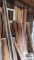 Lot of wooden trim and lumber in garage