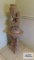 Ceramic figurine on ceramic matching stand