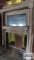 Antique fireplace mantel with mirror