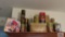 Lot of assorted tins on top of cabinet
