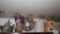 Lot of decorative boxes, vase, basket and wreath on top of headboard