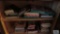 Lot of assorted books and games in bottom of cabinet
