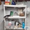 Topsy Turvy planter, assorted metal cookie cutters, Farberware electric griddle, bottles and etc on