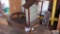 Glass and wooden knick knack shelf, candle sconce, plastic coat hangers and coffee table frame