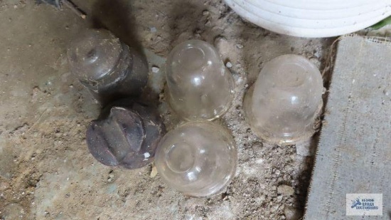 Antique insulators and glass planters