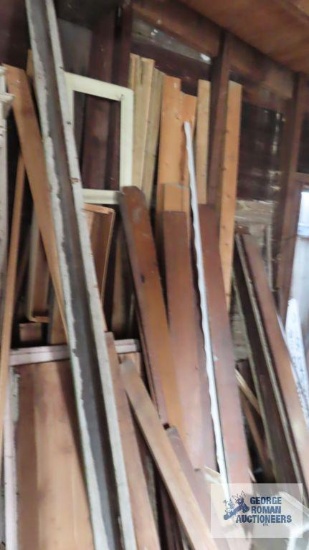 Lot of wooden trim and lumber in garage