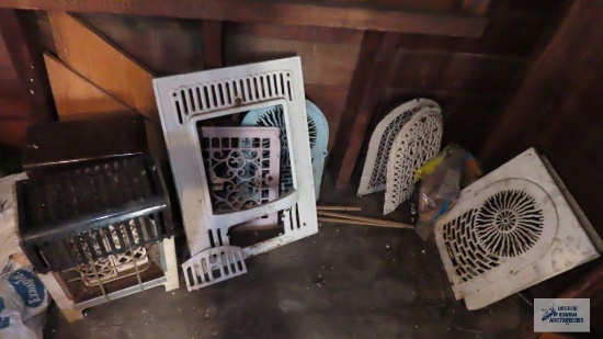Lot of two gas heaters and decorative antique vent covers