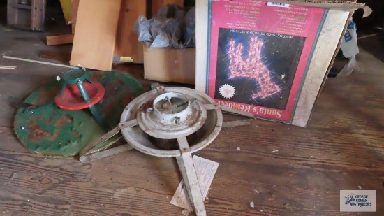 Outdoor lighted reindeer and two Christmas tree stands