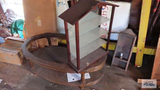 Glass and wooden knick knack shelf, candle sconce, plastic coat hangers and coffee table frame