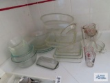 Lot of assorted baking dishes, butter dish and glass juicer