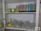 Lot of colored plastic ware...and clear glassware