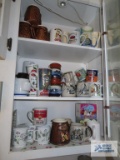 Lot of coffee mugs and etc in one cabinet