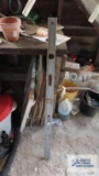 Aluminum level, gutter guard, and drop light