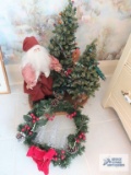 Lighted Santa and trees Christmas decoration