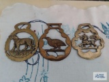 Three brass figurine decorations
