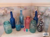 Bottles, mason jars and vase