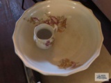 Antique floral wash bowl and hollyhocks pitcher. Bowl has crack in bottom.