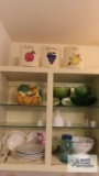 Enamelware strainer, candy dishes, plates and etc in cabinet and on top of cabinet