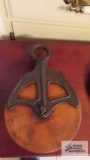 Antique wooden and cast iron pulley